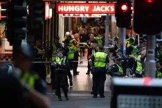 Sydney man charged after armed lockdown; child shot in separate incident