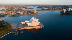 Did the Australian budget outcome reveal a deficit over $11 billion lower than expected?