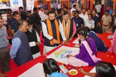 Bihar CM Reviews Student Art on 'My Dream India' Theme