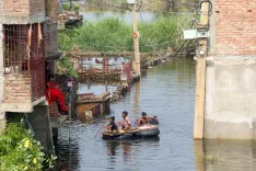 Bihar floods 2025: Viral video of father carrying son to school sparks outrage