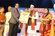 CM Dhami at Kumaon Dwar Mahotsav, flags UCC and identity laws