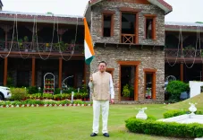 CM Dhami hoists Tricolour at residence for Har Ghar Tiranga