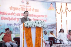 CM Dhami Lays Foundation of Banbasa Badminton Court, Flags Off NHPC Vehicles