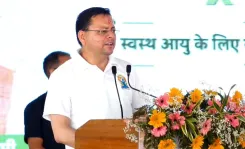 CM Dhami Leads Yoga Day Celebrations in Banbasa