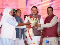CM Dhami Touts UCC and Madrasa Overhaul at Dehradun Beneficiary Meet