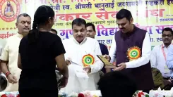 CM Fadnavis, Gadkari honour Charmakar students in Nagpur