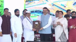 CM Fadnavis Hands Property Docs to Raigad Landholders