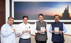 CM Fadnavis Launches Two Books by Prof Vinay Bhole at Varsha