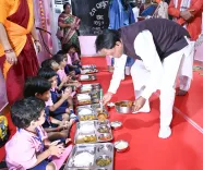 CM Majhi joins 9th Poshan Maah, serves meals to children
