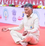 CM Naidu joins Yoga Day celebrations in Vijayawada with Ramdev