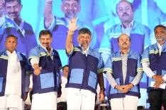 CM Shivakumar honours sanitation workers at Palace Grounds