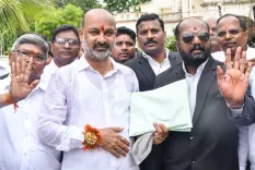 Why has Bandi Sanjay been summoned in a Rs.10 crore defamation suit by KT Rama Rao?