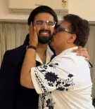Daboo Malik kisses son Amaal Mallik, calls it 'a life time in a moment'
