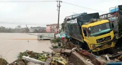 What is the latest on the rising death toll from flooding in Vietnam?