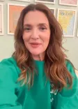 Drew Barrymore reunites with flight attendant who held her as she wept