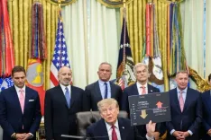 Nine drugmakers pledge $19.6 billion for US manufacturing under Trump push