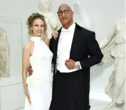 Dwayne Johnson makes MET Gala debut with Lauren Hashian in bespoke Thom Browne