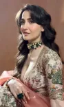 Why does Elli AvrRam emphasize ‘lifting heavy weights’ for women?
