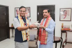 Himanta Sarma meets Pralhad Joshi on education, food supply, renewable energy