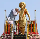 How Does PM Modi Honor Birsa Munda on His 150th Birth Anniversary?