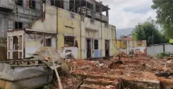 Why Was the Historic Redlands Building Demolished in Shillong?