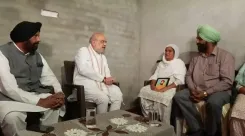 Amit Shah meets kin of slain anti-drug activist Vikramjeet Singh in Gurdaspur