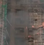 हांगकांग: बहुमंजिला इमारतों में लगी आग, कई लोग फंसे