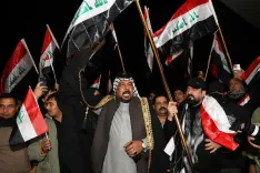 Iraq militia group postpones retaliation against US, Saudi forces