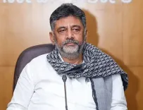 Why is K'taka Deputy CM Shivakumar Targeting Deve Gowda and Kumaraswamy Over Land Acquisition?