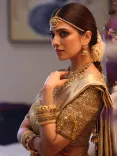 Malavika Mohanan's first look from 'Idhayam Murali' cameo with Fahadh Faasil