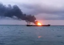 Merchant vessel ablaze near Strait of Hormuz after attack, crew seeks help