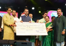 MLA Phatak hands ₹5 lakh cheque to CM Fadnavis for drought relief