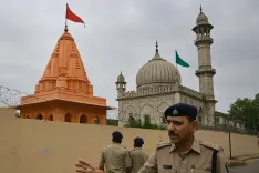 How is the MP temple-mosque dispute being managed for peace?