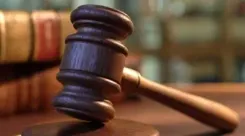 Why is the National Lok Adalat taking place across India today?