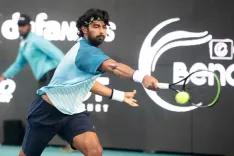 How did Niki Kaliyanda Poonacha qualify for the Australian Open 2026 main draw?