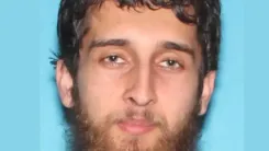 Is a Pakistan-born US Citizen Facing Charges for Possessing a Machine Gun?