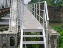 How are pathways on railway bridges enhancing safety and accessibility across NFR?