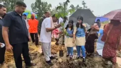 Pradhan Plants a Tree for Mother Earth in Redhakhol