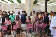 Puri Distributes Cycles to Girls, Hails Sonbhadra's Rise