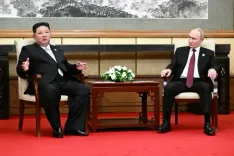 Putin invites North Korea's Kim to Russia as they meet in Beijing