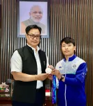 Rijiju meets Roshibina Devi, India's first 3-time Asian Games Wushu medallist