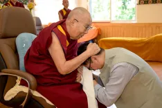 Rijiju visits Dalai Lama in Delhi, wishes him speedy recovery