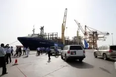 Did a Saudi-led coalition discover weapons in a shipment arriving at Mukalla port?