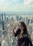 Sonalika Joshi poses in purple saree at New York's Empire State Building
