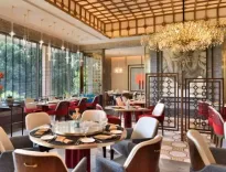 Why Did a Startup Founder Criticize the Taj Hotel for Teaching Her How to Sit?