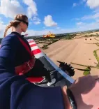 Sydney Sweeney straps onto airplane top in Tom Cruise-style stunt