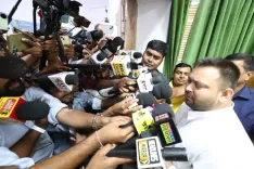 Tejashwi demands disqualification of 2 MLCs who joined BJP after independent win
