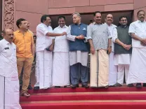 Tharoor Greets Kerala CM Satheesan at Parliament