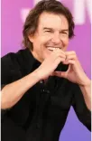 Tom Cruise recalls puking on first fighter jet flight, teases Top Gun 3