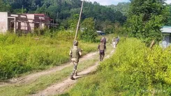 Who were the two PLA militants arrested for the Manipur ambush?